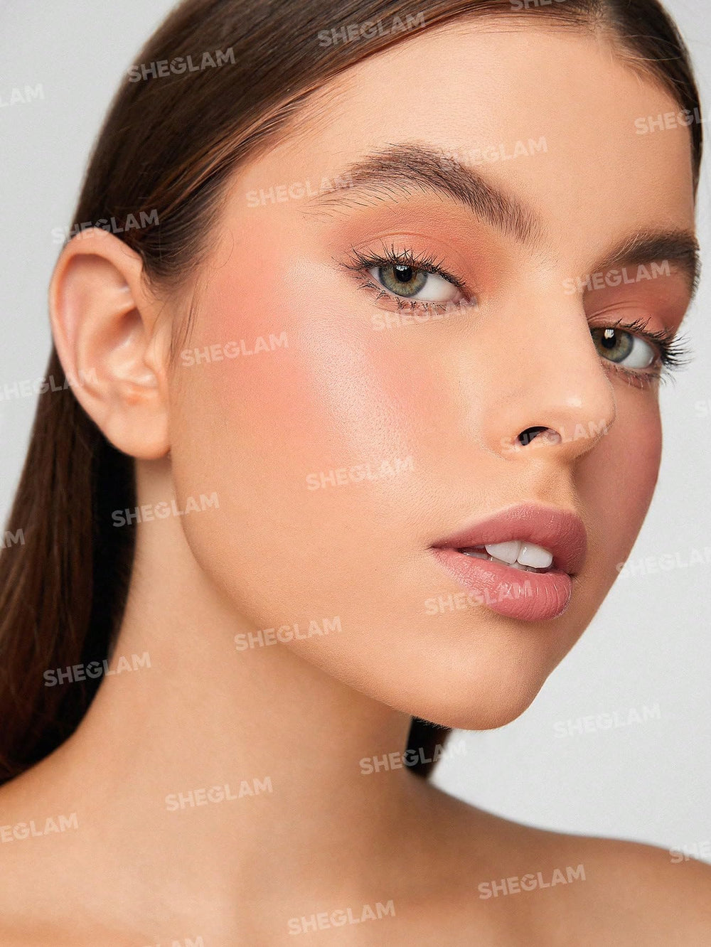 SHEGLAM open stick tip displaying creamy formula for precise application