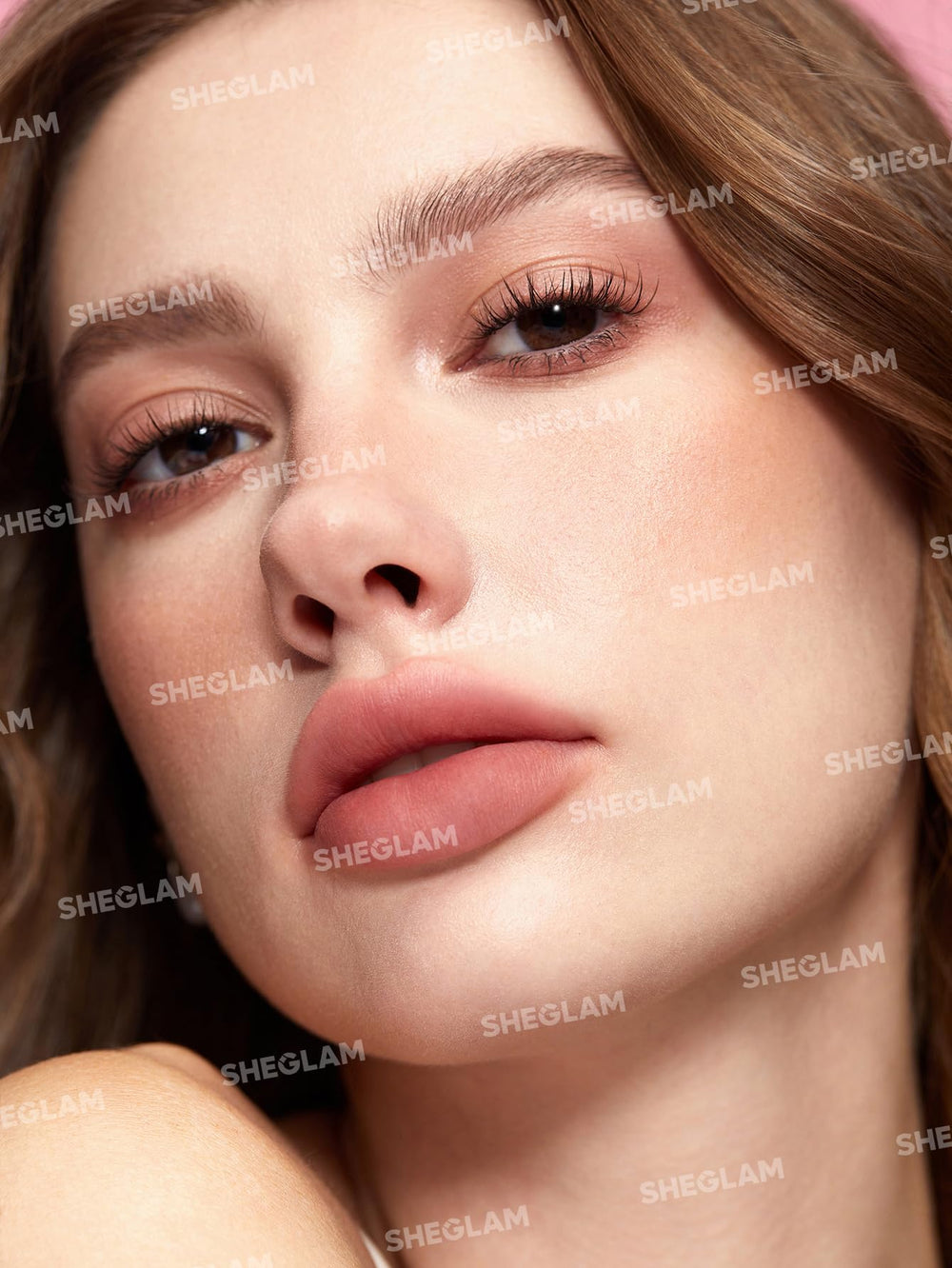 SHEGLAM on model lifestyle shot demonstrating wearable blurred-lip effect