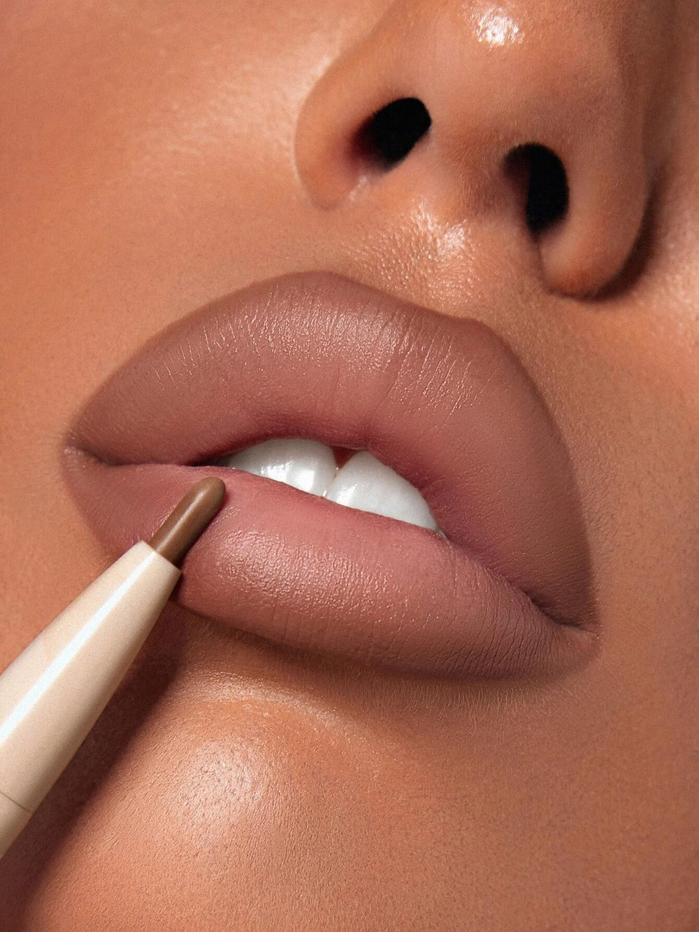 SHEGLAM on model wearing Warm Nutmeg evening look, long-lasting matte effect
