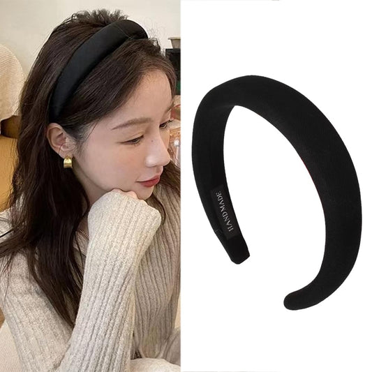 ShiQiao Spl front view of black padded headband showing sleek silhouette and versatile styling