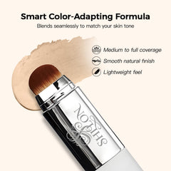 SHLLON stick beside hand for scale, showing compact size ideal for touch-ups