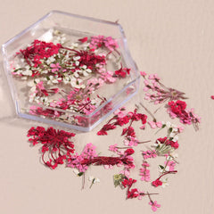 SILPECWEE tweezers placing flower on nail demonstrating precise application benefit