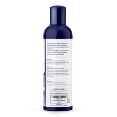 Silver Miracles conditioner held in hand to show size and travel-friendly benefit