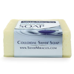 Silver Miracles soap beside a coin showing compact travel-friendly size