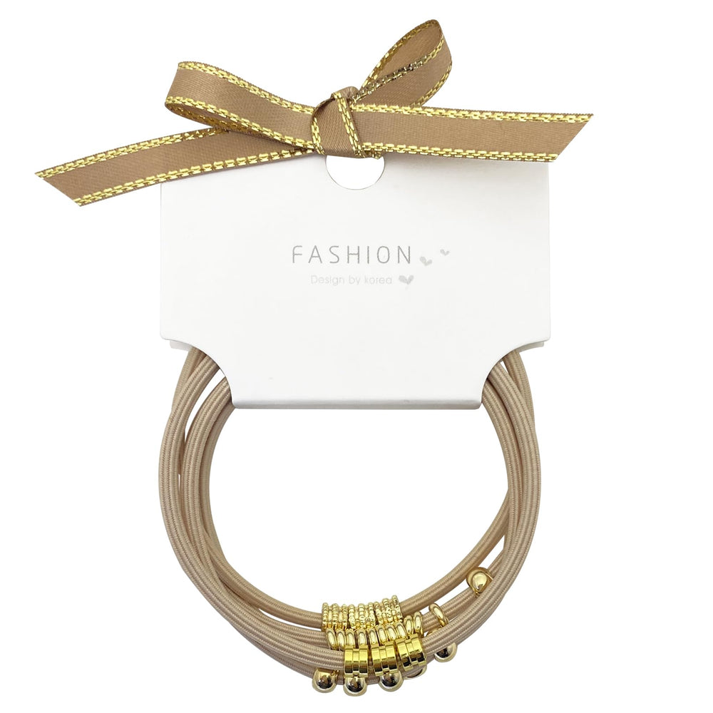 SISYOUP hair ties styled at a beach festival showing fashionable, travel-ready look