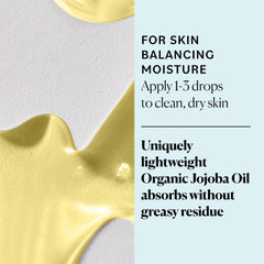 Sky Organics jojoba oil in hand demonstrating small-drop dosage and control