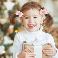 Snokkcomss bow worn in hair side profile, provides comfortable fit