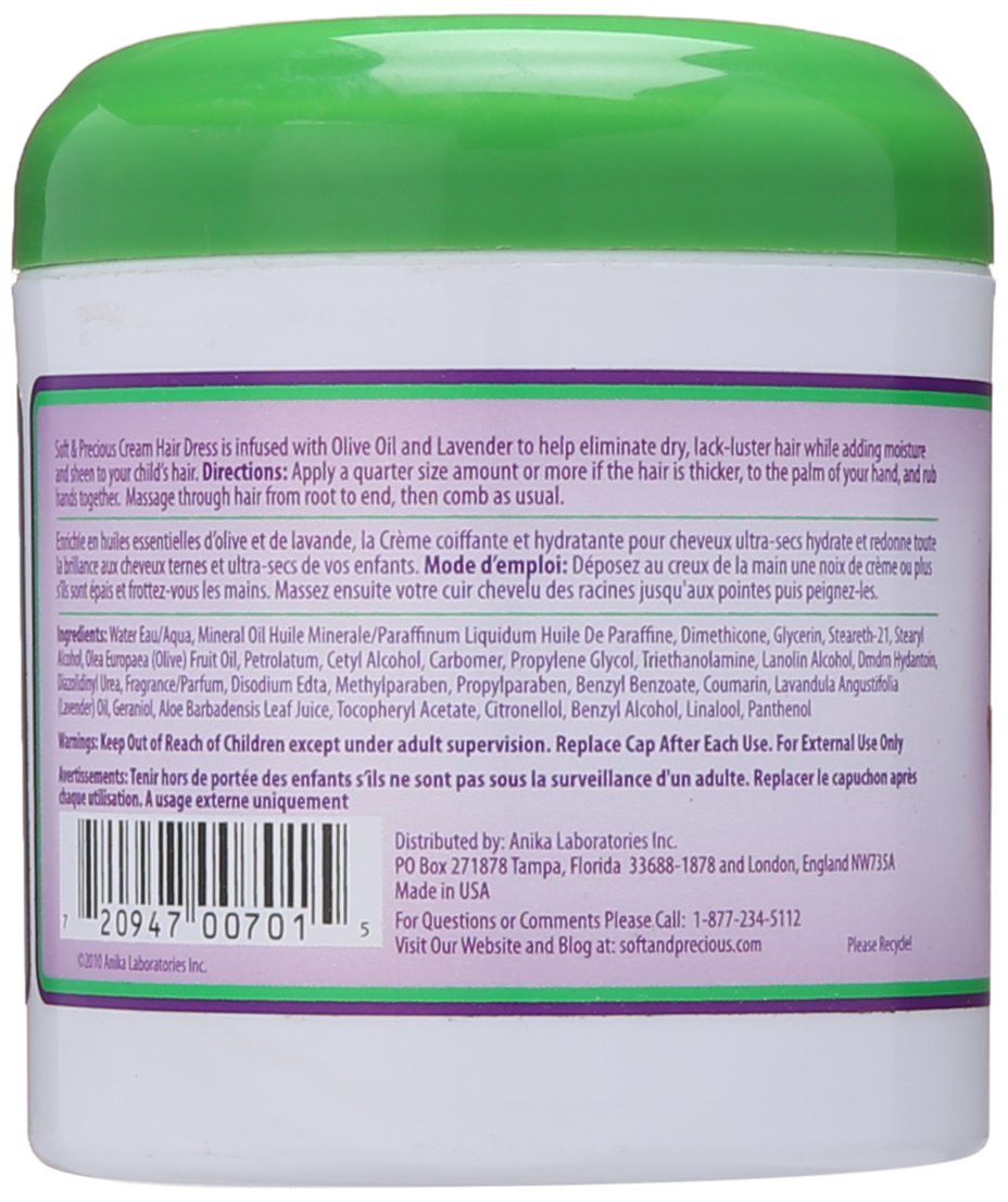 Soft & Precious close-up of cream texture applied to baby hair for smooth finish