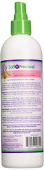 Soft & Precious detangler being sprayed on hair for easier combing and softness