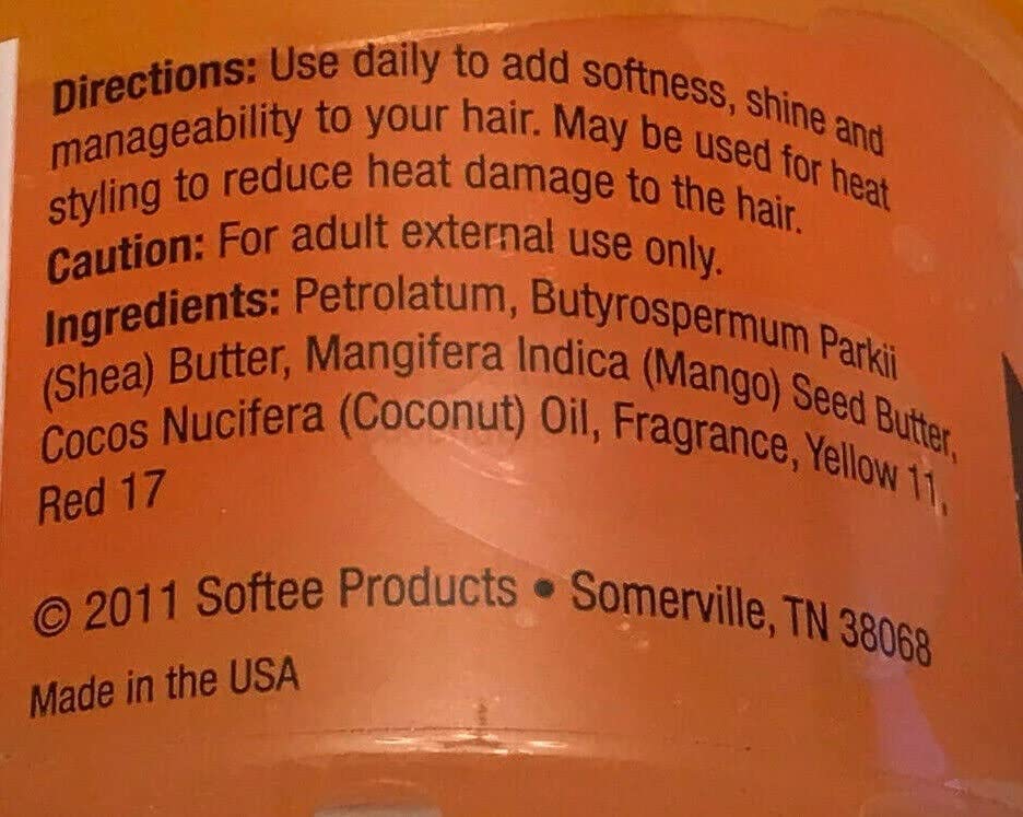 Softee mango butter applied in hair during styling showing smoother strands and reduced frizz benefit