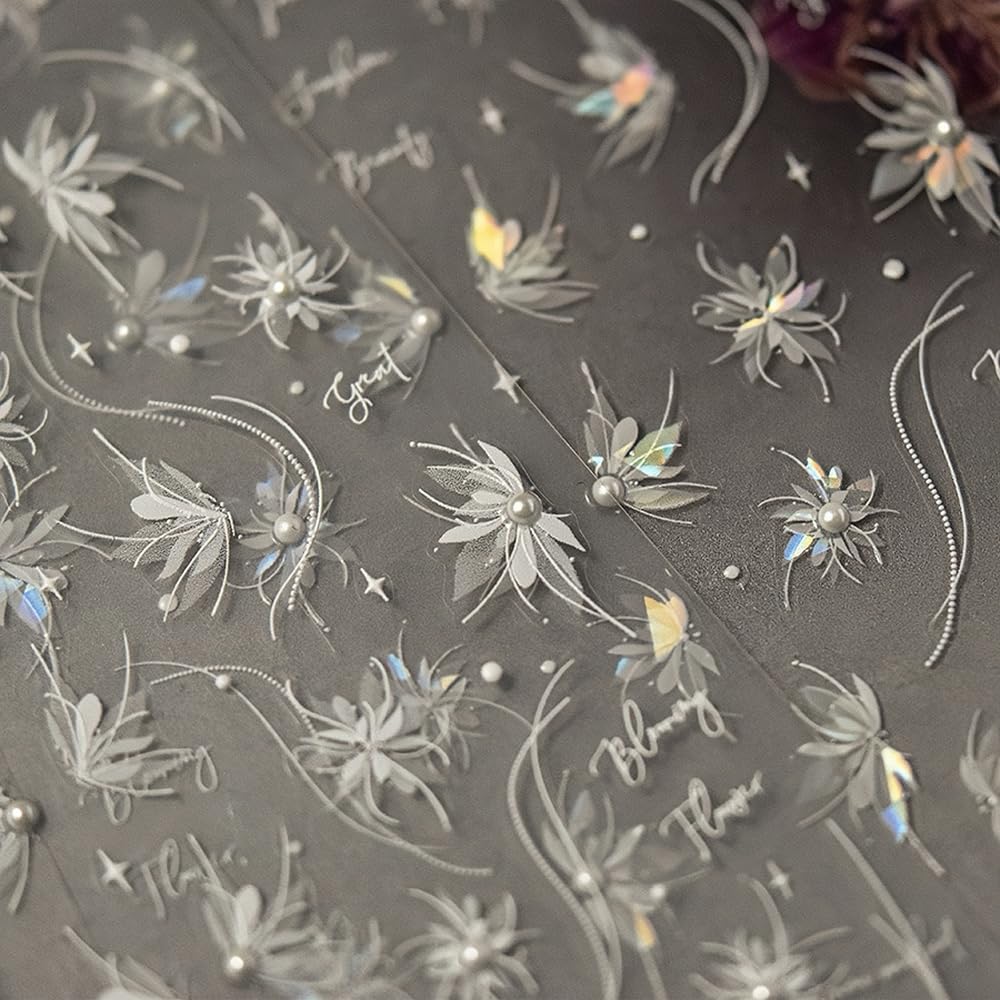 SOFTSOUL tweezers and scissors beside sticker sheet for precise placement benefit