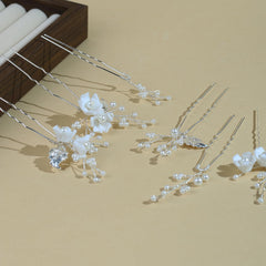 SOLENY hair pin placed in bride updo showing how it enhances wedding hairstyle
