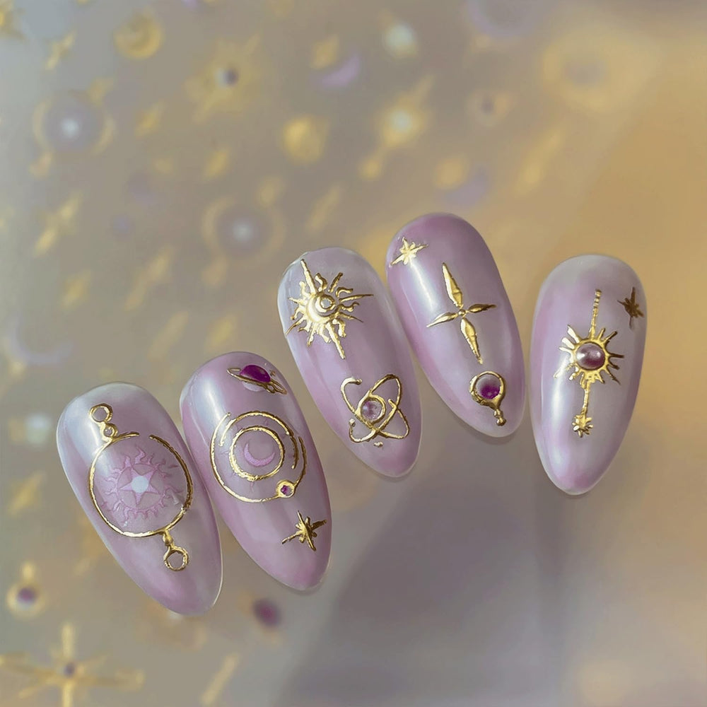 Spebozy gold stars on natural nails, adds retro elegance to everyday look