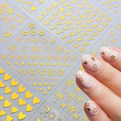 SPLOCUDU lifestyle shot on manicure table showing stickers used for creative nail styling