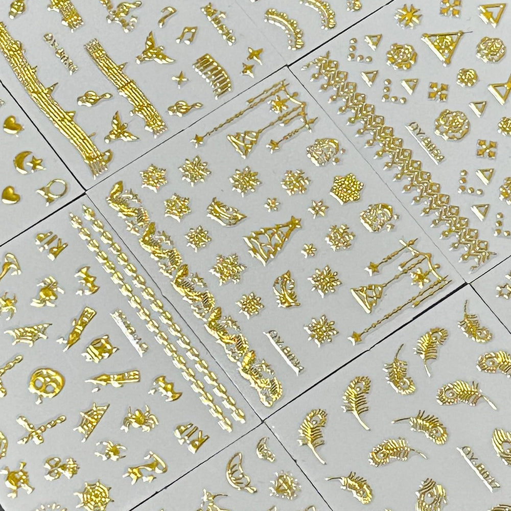SPLOCUDU overhead view of multiple sheets displaying varied gold motifs