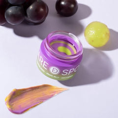 SPODARE on a nightstand beside a candle portraying bedtime routine and calming aroma