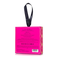 SPONGELLÉ sponge next to hand illustrating compact travel-friendly benefit