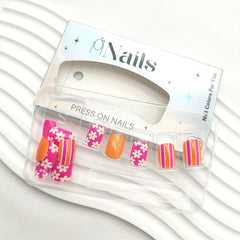 STADWWK showing a hand applying a press-on nail for quick salon-free finish