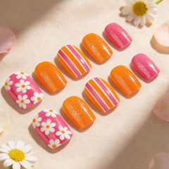 STADWWK nails on fingers to show size and short square shape for fit reference