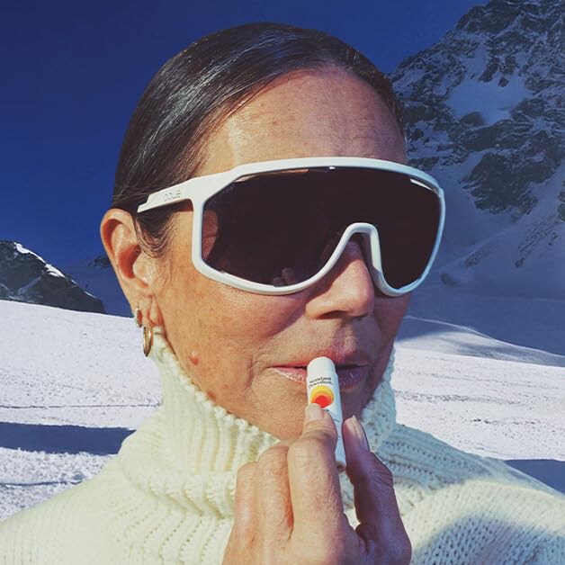 Standard Procedure lip balm applied on lips offering visible hydration and sun defense