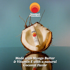 Standard Procedure lip balm in a beach bag portraying outdoor protection and portability
