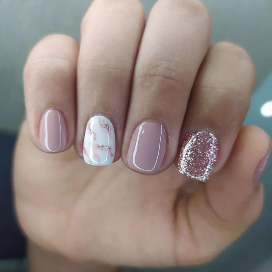 Stbisen front packaging showing dusty pink nude press-on nails, easy at-home manicure