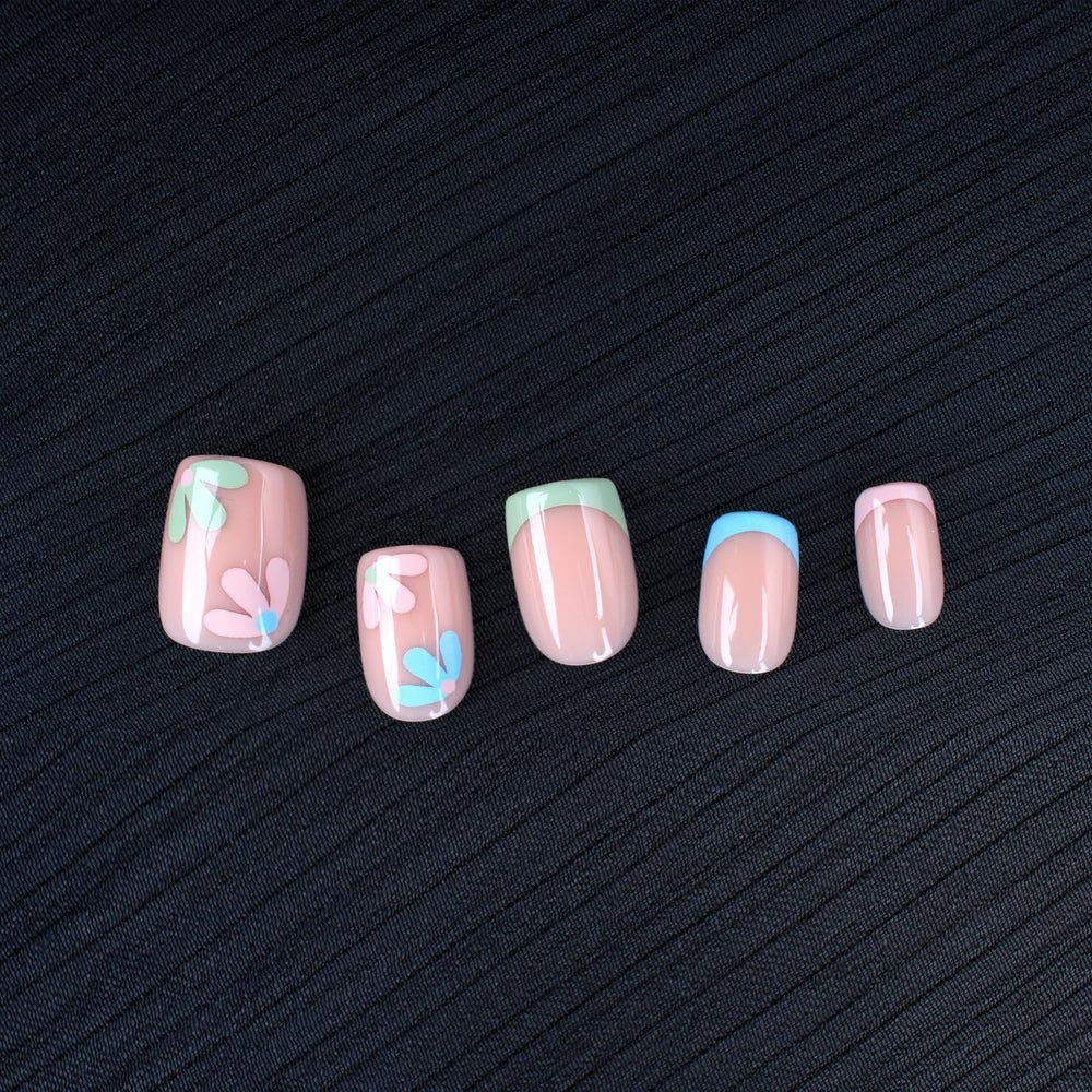 Stbisen arranged 30 press-on nails displaying sizes and blossom-pink designs