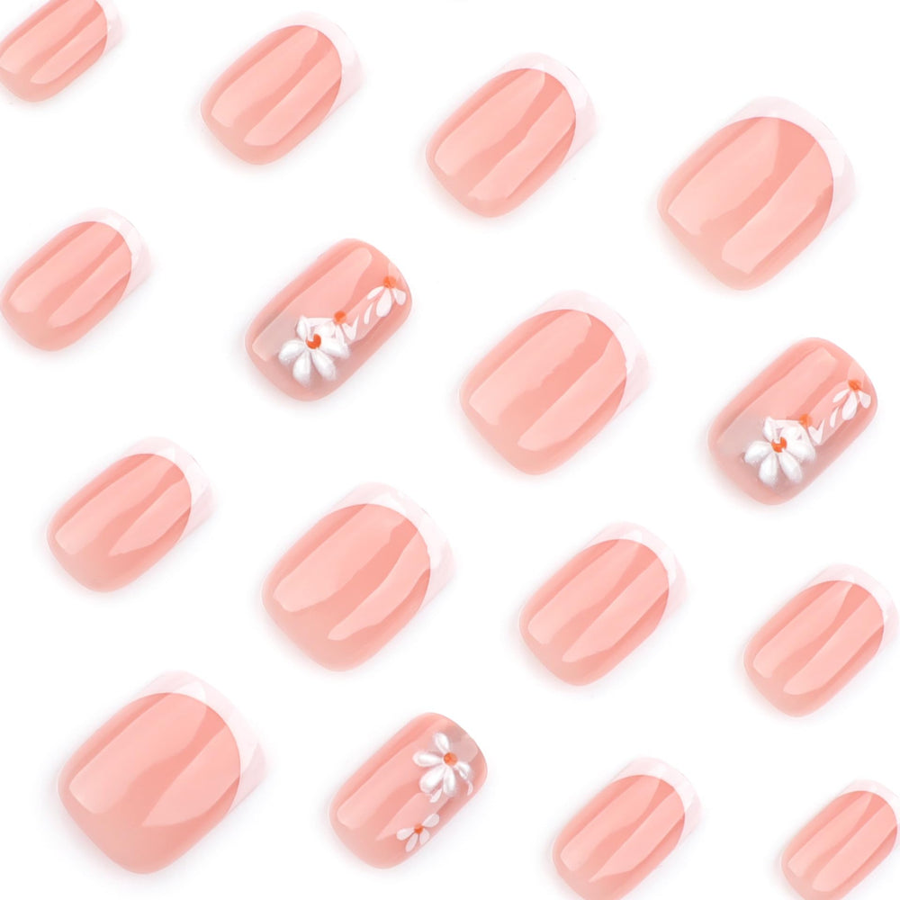 Layout of Stbisen kit accessories including glue, adhesive tabs, file, cuticle stick and cleaning pads