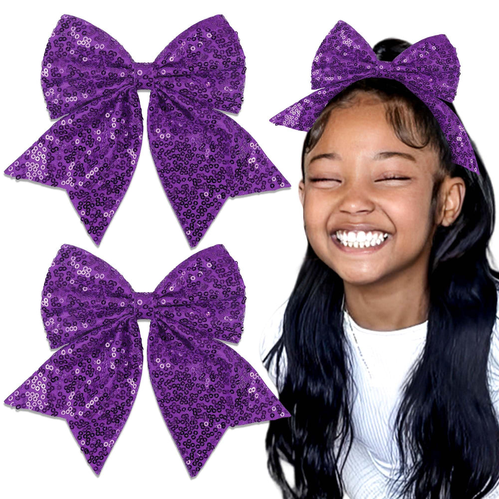 STGDAK front view of purple glitter bow pair showcasing color and shape for standout style