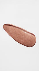 stila swatches on forearm showing shade range and high-shimmer payoff