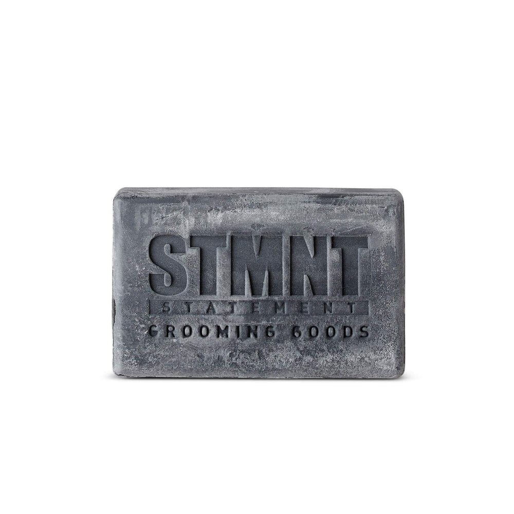 STMNT activated charcoal texture close-up highlighting purifying ingredients benefit