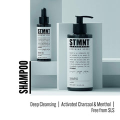 STMNT shampoo pump and label detail highlighting ingredients and clean formula benefit