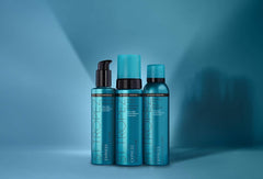 St.Tropez lifestyle shot spraying back and shoulder for easy reach