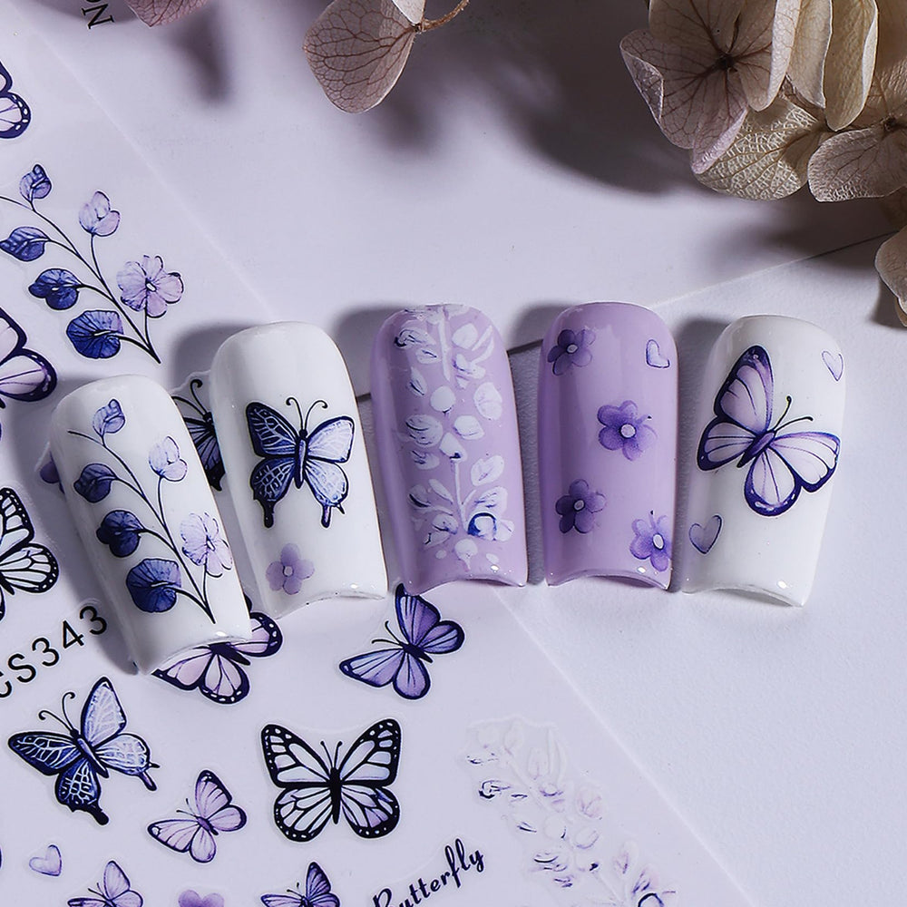 STZPRONAIL lifestyle image of woman with butterfly manicure showcasing wearable style