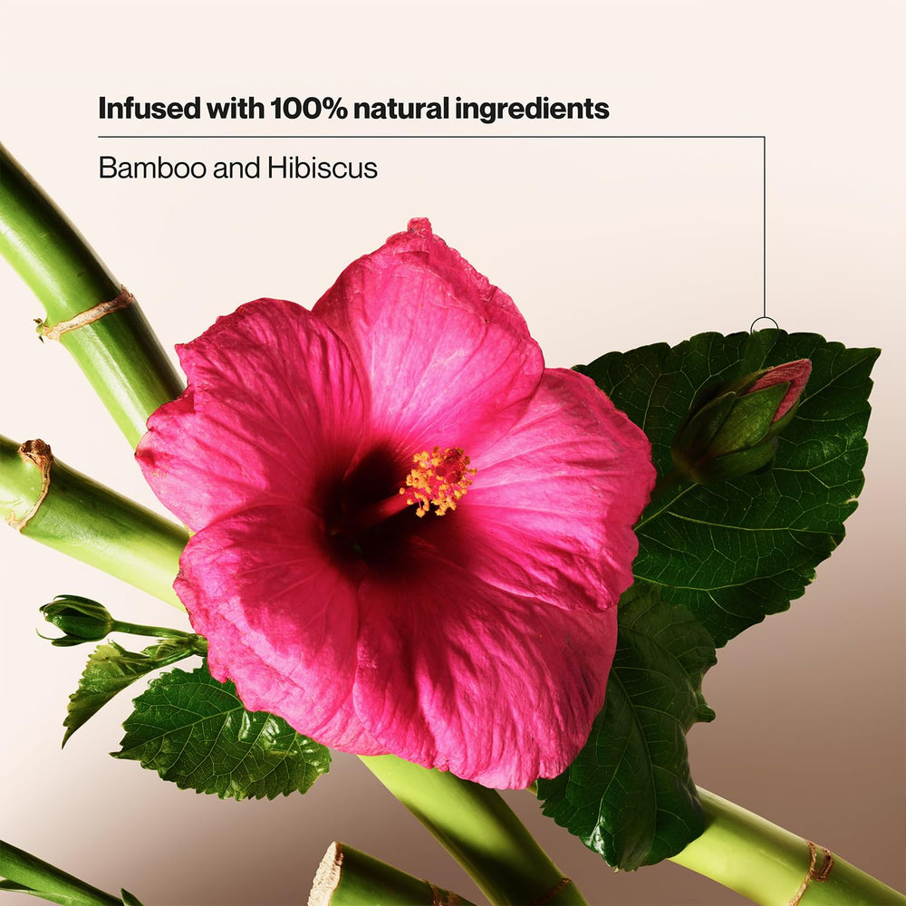 Suave bamboo and hibiscus ingredients display highlighting natural extracts