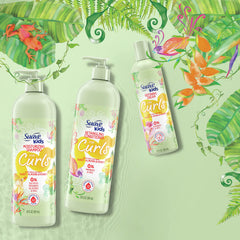Suave Kids cream next to hand to demonstrate 12-ounce scale and usage