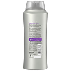 Close-up of Suave conditioner texture on hand showing creamy lightweight formula for fuller hair