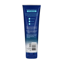 Hand holding 9 oz Suave gel to show scale for travel and gym-ready styling