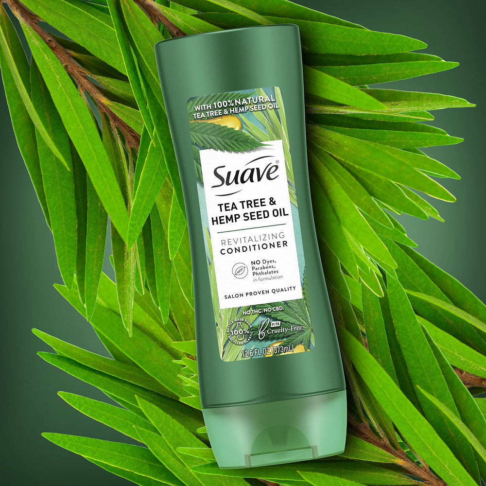 Suave tea tree hemp bottle in hand showing 12.6 oz scale and convenience