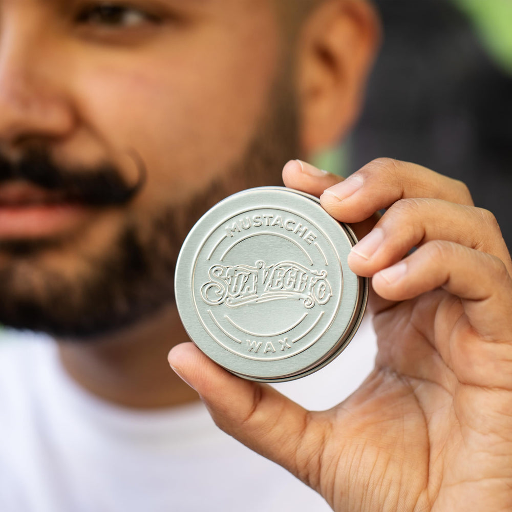 Suavecito tin on bathroom counter in lifestyle scene showing daily grooming convenience benefit
