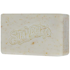 Suavecito bar held in hand next to ruler showing 6 oz size and travel convenience
