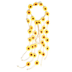 Sucrain lifestyle beach setting showing sunflower crown adding boho charm to summer outfit