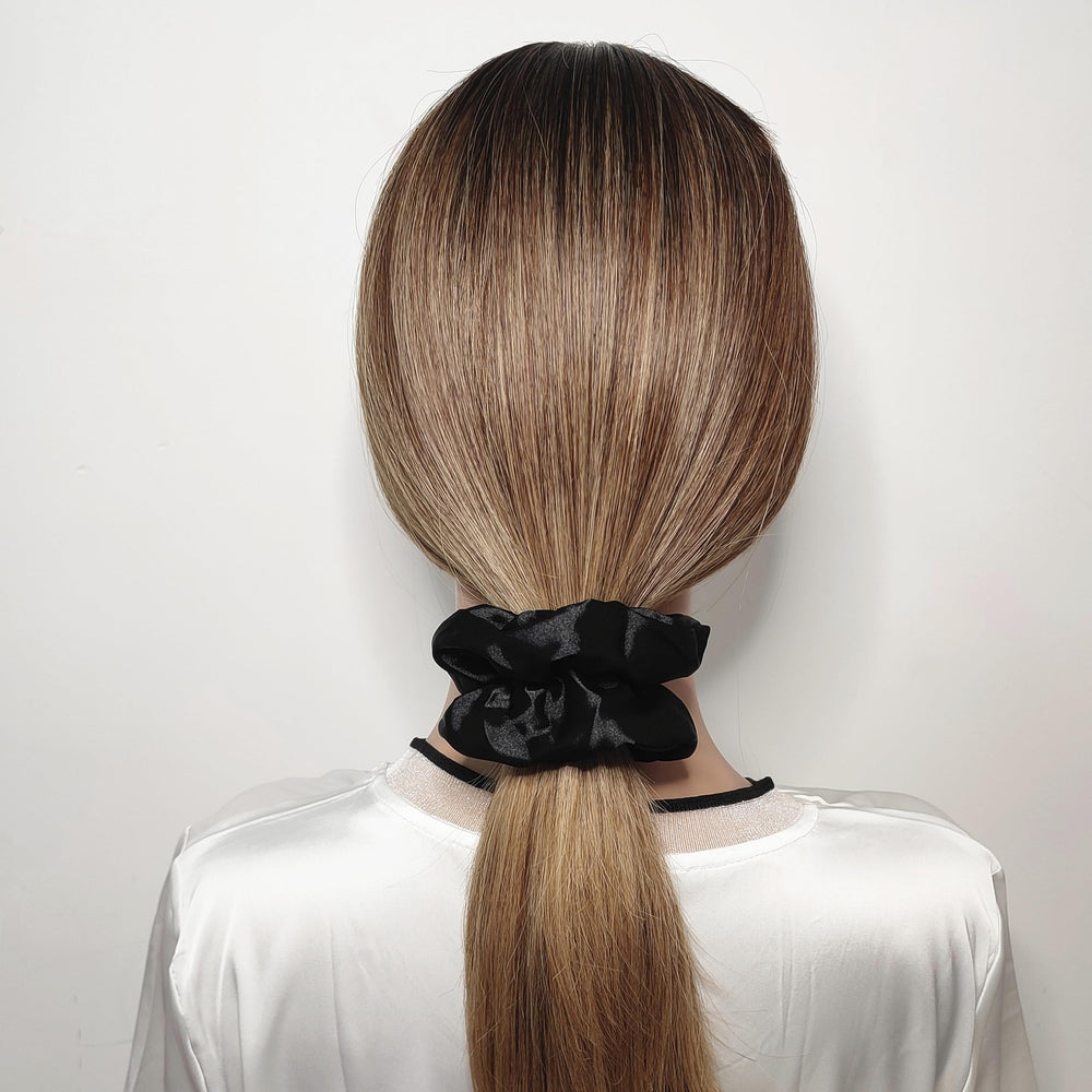 Sufermoe close-up satin texture highlighting smooth fabric and hair-friendly finish
