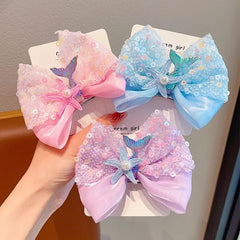 Suiwesey clips paired with beach outfit for mermaid-themed styling