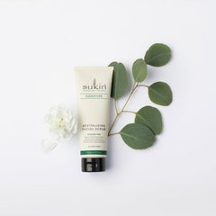 Sukin scrub on bathroom counter styled for a relaxing at-home spa