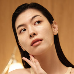 Sulwhasoo mask in bedroom setting on nightstand, conveys nightly ritual and restorative overnight benefit