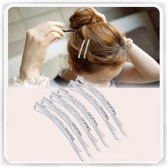 SUMAJU pins arranged on a tabletop with other accessories showing versatile styling benefit