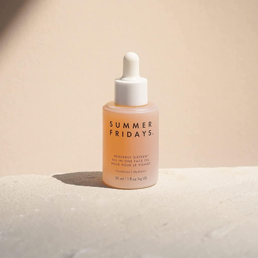 Summer Fridays dropper dispensing a clear drop of oil highlighting precise application