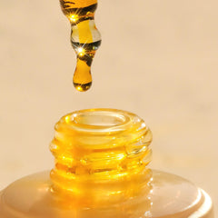 Summer Fridays held in hand to show 1 fl oz scale for travel-friendly convenience
