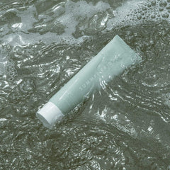 Summer Fridays used to remove eye and face makeup, showing effective makeup removal